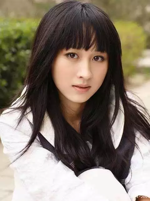 练束梅