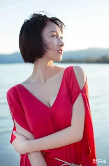 练束梅