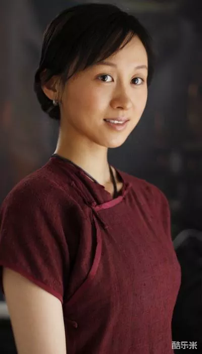 练束梅
