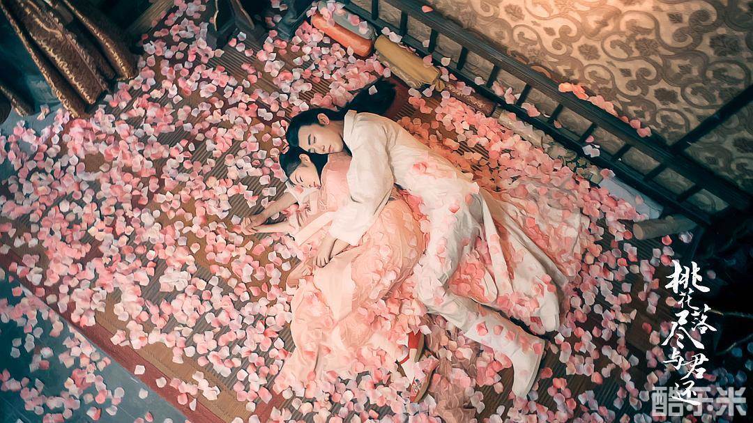 桃花落尽与君还