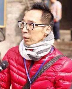袁英明