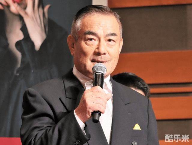 辻万长