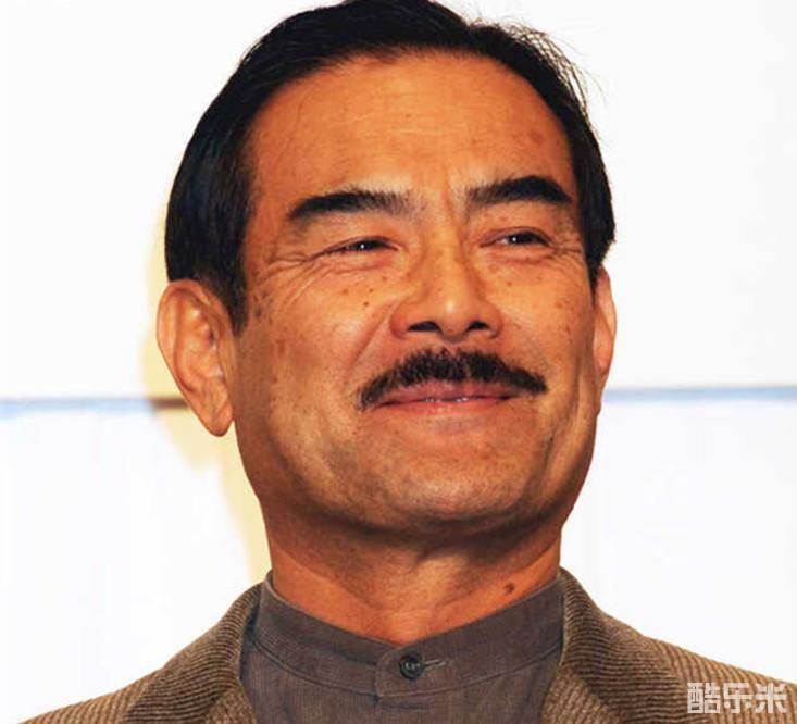辻万长